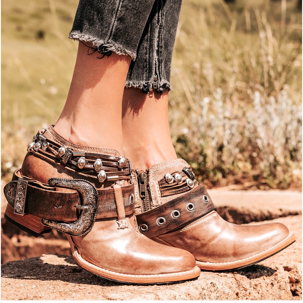 Beautiful crafted Western style booties size 8 color Taupe. Worn only once.
